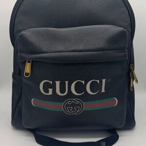 Gucci Black Leather Backpack with Gold Accents